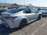 2023 Toyota Camry Hybrid XSE with VIN 4T1K31AK0PU051132, listed as a IAAI auction lot 42945793 with 48,781 mi miles and . Bid and sale history available at DreamBid. Image 4.