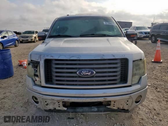 2012 Ford F-150 FX2 with VIN 1FTFW1CF1CFB34595, listed as a Copart auction lot 87390045 with 303,572 mi miles and Salvage title. Bid and sale history available at DreamBid. Image 5.