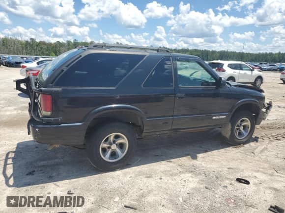 2005 Chevrolet Blazer z VIN 1GNCS18X35K106637, wystawiony jako Copart lot #55998405 z przebiegiem 197 709 mil mil oraz Szkoda całkowita • Salvage title. Historia ofert i sprzedaży dostępna na DreamBid. Obrazek 3.