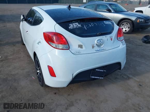 2014 Hyundai Veloster z VIN KMHTC6AD0EU204382, wystawiony jako IAAI lot #40287015 z przebiegiem 110 460 mil mil oraz . Historia ofert i sprzedaży dostępna na DreamBid. Obrazek 3.