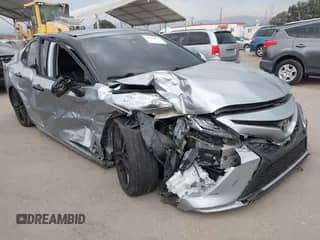 2021 Toyota Camry XSE z VIN 4T1KZ1AK6MU055986, wystawiony jako IAAI lot #42410896 z przebiegiem 151 900 mil mil oraz . Historia ofert i sprzedaży dostępna na DreamBid. Obrazek 1.