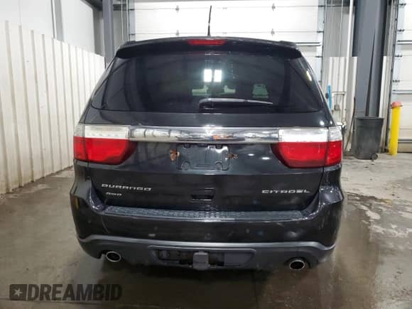 2012 Dodge Durango Citadel with VIN 1C4SDJET7CC301941, listed as a Copart auction lot 68397715 with 157,235 mi miles and Salvage title. Bid and sale history available at DreamBid. Image 6.