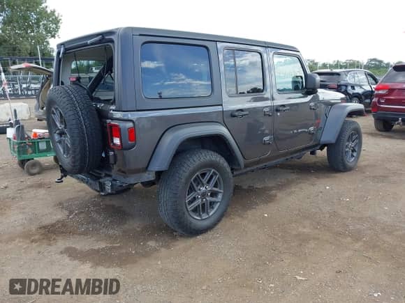 2024 Jeep Wrangler Sport S with VIN 1C4PJXDN1RW123245, listed as a IAAI auction lot 43004987 with 18,144 mi miles and . Bid and sale history available at DreamBid. Image 4.