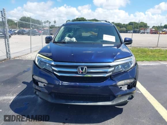 2017 Honda Pilot EX-L with VIN 5FNYF5H52HB019855, listed as a IAAI auction lot 43366867 with 121,526 mi miles and . Bid and sale history available at DreamBid. Image 12.