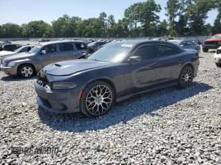 2019 Dodge Charger GT с VIN 2C3CDXHG9KH686330, выставлен на аукционе Copart как лот 64657355 с пробегом 174 413 миль миль и Списание • Salvage title. История ставок и продаж доступна на DreamBid. Изображение 1.