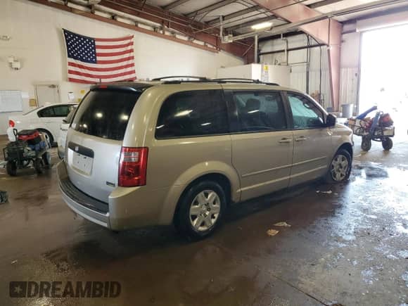 2009 Dodge Grand Caravan SE с VIN 2D8HN44EX9R619968, выставлен на аукционе Copart как лот 81348435 с пробегом 212 981 миль миль и Чистый • Clean title. История ставок и продаж доступна на DreamBid. Изображение 3.