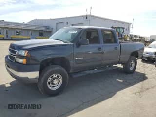 2005 Chevrolet Silverado 2500HD LS with VIN 1GCHC23U35F801207, listed as a Copart auction lot 52006125 with 160,928 mi miles and Salvage title. Bid and sale history available at DreamBid. Image 1.