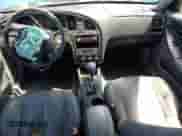 2004 Hyundai Elantra GT z VIN KMHDN56D24U104882, wystawiony jako Copart lot #64136915 z przebiegiem 135 495 mil mil oraz Szkoda całkowita • Salvage title. Historia ofert i sprzedaży dostępna na DreamBid. Obrazek 8.