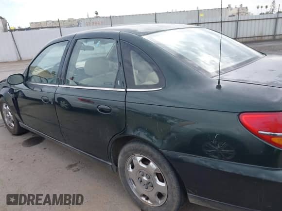 2000 Saturn LS z VIN 1G8JU52F1YY651684, wystawiony jako IAAI lot #43342271 z przebiegiem 329 804 mil mil oraz . Historia ofert i sprzedaży dostępna na DreamBid. Obrazek 15.