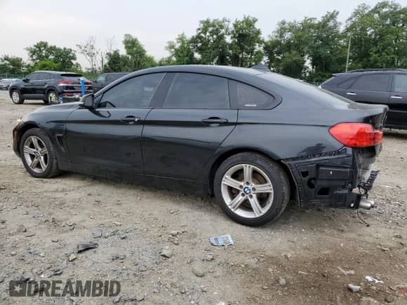2015 BMW 4 Series 428i xDrive z VIN WBA4A7C52FD414720, wystawiony jako Copart lot #67213025 z przebiegiem 152 101 mil mil oraz Szkoda całkowita • Salvage title. Historia ofert i sprzedaży dostępna na DreamBid. Obrazek 2.