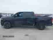 2025 Ram 1500 Big Horn z VIN 1C6RREFP3SN634401, wystawiony jako IAAI lot #41434346 z przebiegiem 4 226 mil mil oraz . Historia ofert i sprzedaży dostępna na DreamBid. Obrazek 14.