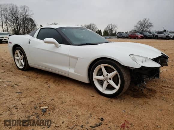 2012 Chevrolet Corvette 1LT с VIN 1G1YA2DW0C5101842, выставлен на аукционе Copart как лот 46094805 с пробегом 48 493 миль миль и Списание • Salvage title. История ставок и продаж доступна на DreamBid. Изображение 4.