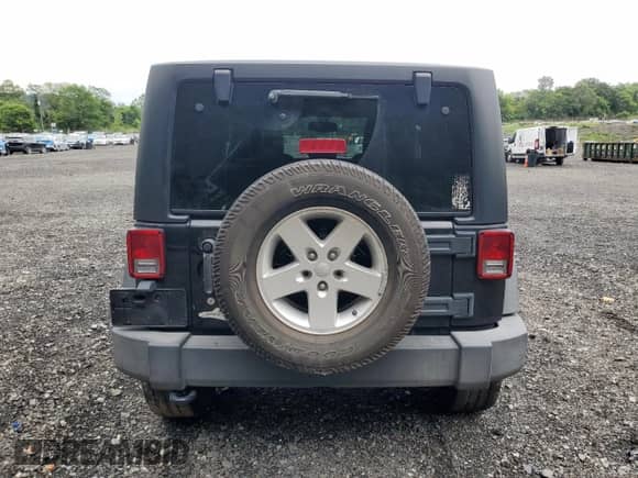 2018 Jeep Wrangler Sport S with VIN 1C4AJWAG7JL882414, listed as a Copart auction lot 67066205 with 164,179 mi miles and Salvage title. Bid and sale history available at DreamBid. Image 6.