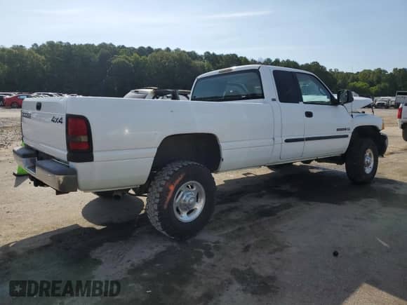 2001 Dodge 2500 with VIN 1B7KF23W01J512727, listed as a Copart auction lot 63804254 with 148,220 mi miles and Salvage title. Bid and sale history available at DreamBid. Image 3.