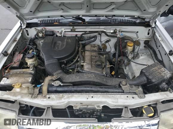 2000 Nissan Frontier XE with VIN 1N6DD21S4YC321371, listed as a Copart auction lot 55678675 with 99,775 mi miles and Salvage title. Bid and sale history available at DreamBid. Image 11.