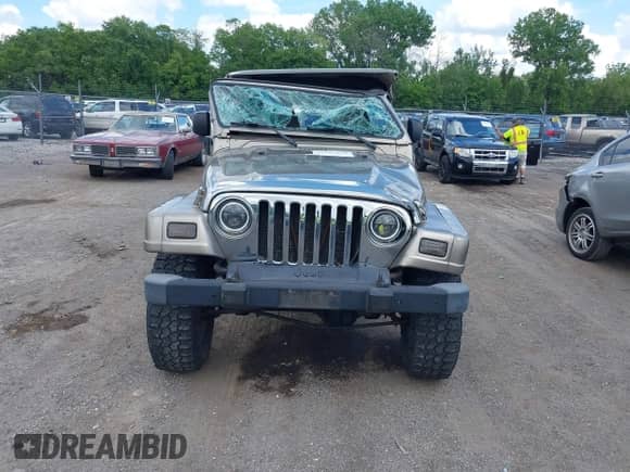 2004 Jeep Wrangler Sahara с VIN 1J4FA59S54P740417, выставлен на аукционе IAAI как лот 42382078 с пробегом 200 108 миль миль и . История ставок и продаж доступна на DreamBid. Изображение 13.