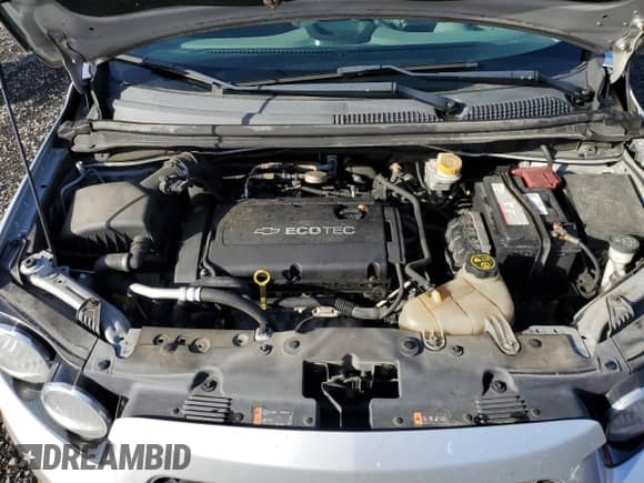 2014 Chevrolet Sonic LT z VIN 1G1JC5SG2E4152700, wystawiony jako Copart lot #90410025 z przebiegiem 153 812 mil mil oraz Czysty tytuł • Clean title. Historia ofert i sprzedaży dostępna na DreamBid. Obrazek 11.