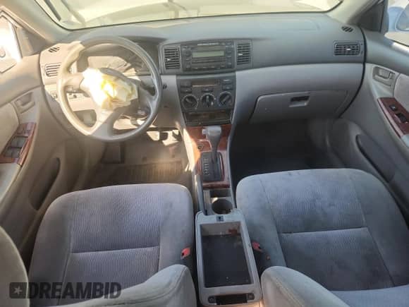 2005 Toyota Corolla CE с VIN 1NXBR32E55Z427999, выставлен на аукционе Copart как лот 71066515 с пробегом Не указан миль и Списание • Salvage title. История ставок и продаж доступна на DreamBid. Изображение 8.