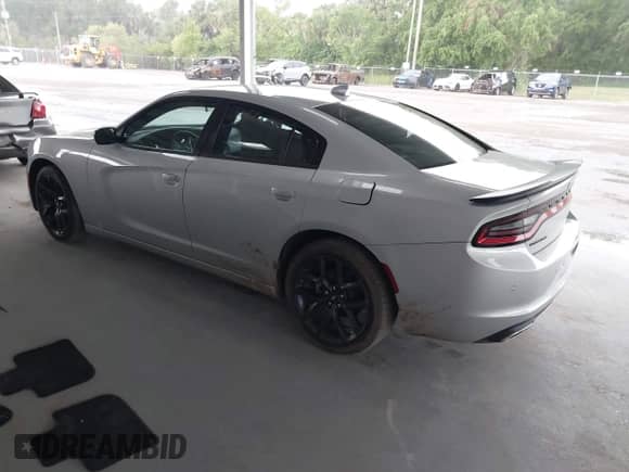2023 Dodge Charger SXT with VIN 2C3CDXBG3PH632036, listed as a IAAI auction lot 42560816 with 48,956 mi miles and . Bid and sale history available at DreamBid. Image 3.