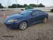 2008 Hyundai Tiburon GT z VIN KMHHN66F38U288082, wystawiony jako Copart lot #64058395 z przebiegiem 162 668 mil mil oraz Szkoda całkowita • Salvage title. Historia ofert i sprzedaży dostępna na DreamBid. Obrazek 1.