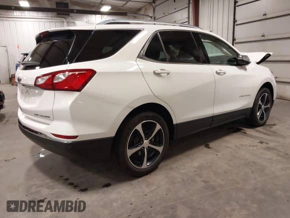 2021 Chevrolet Equinox Premier z VIN 3GNAXXEV1MS107531, wystawiony jako IAAI lot #42281878 z przebiegiem 48 250 mil mil oraz . Historia ofert i sprzedaży dostępna na DreamBid. Obrazek 4.