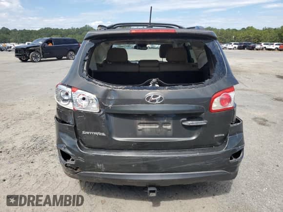 2012 Hyundai Santa Fe Limited с VIN 5XYZK3AB9CG134541, выставлен на аукционе Copart как лот 84774885 с пробегом 182 737 миль миль и На запчасти • Non repairable. История ставок и продаж доступна на DreamBid. Изображение 6.
