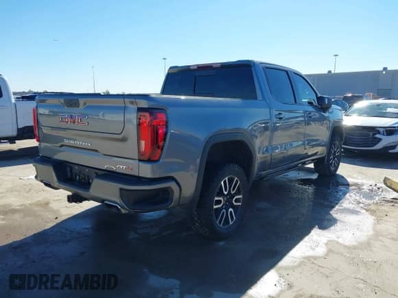2022 GMC Sierra 1500 AT4 with VIN 1GTP9EEL0NZ199090, listed as a IAAI auction lot 41380413 with 100,657 mi miles and . Bid and sale history available at DreamBid. Image 4.