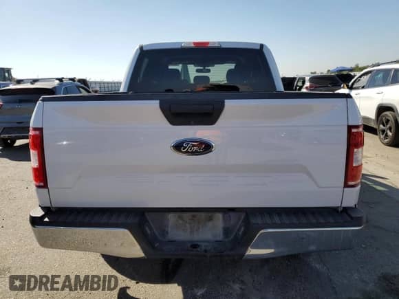 2019 Ford F-150 XL с VIN 1FTEW1C51KKD48687, выставлен на аукционе Copart как лот 82255615 с пробегом 172 854 миль миль и Списание • Salvage title. История ставок и продаж доступна на DreamBid. Изображение 6.