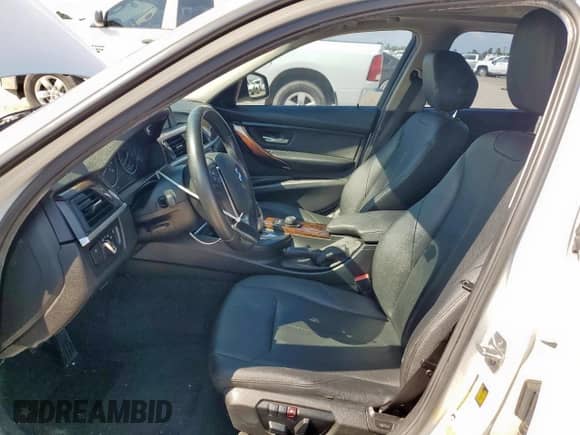 2015 BMW 3 Series 328i with VIN WBA3C1C5XFK123865, listed as a Copart auction lot 71325385 with 209,902 mi miles and Salvage title. Bid and sale history available at DreamBid. Image 7.