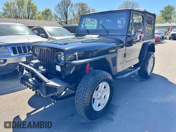 1992 Jeep Wrangler z VIN 2J4FY19P2NJ525592, wystawiony jako Copart lot #56413695 z przebiegiem 156 627 mil mil oraz Czysty tytuł • Clean title. Historia ofert i sprzedaży dostępna na DreamBid. Obrazek 2.