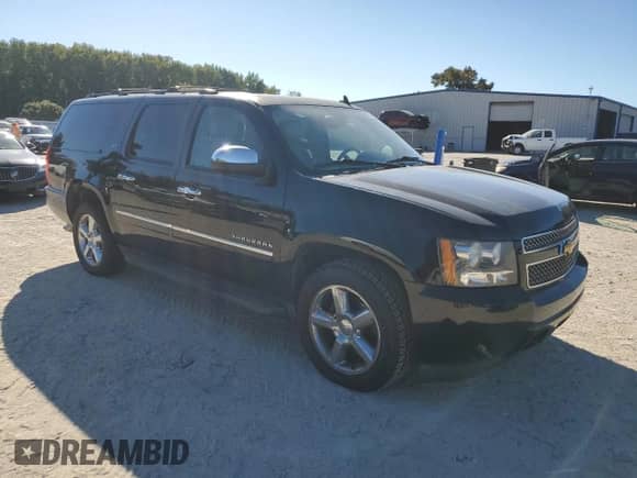 2014 Chevrolet Suburban LTZ with VIN 1GNSKKE71ER167269, listed as a Copart auction lot 84803705 with 191,929 mi miles and Salvage title. Bid and sale history available at DreamBid. Image 4.