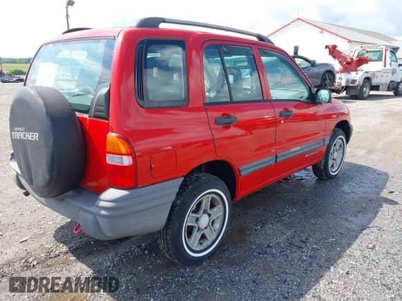 2003 Chevrolet Tracker with VIN 2CNBJ13C636944393, listed as a IAAI auction lot 42280665 with 80,918 mi miles and . Bid and sale history available at DreamBid. Image 4.