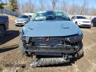 2024 Dodge Hornet GT z VIN ZACNDFAN8R3A36766, wystawiony jako Copart lot #49298535 z przebiegiem 1 923 mil mil oraz Szkoda całkowita • Salvage title. Historia ofert i sprzedaży dostępna na DreamBid. Obrazek 5.