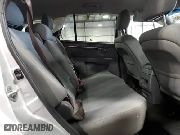 2012 Hyundai Santa Fe GLS z VIN 5XYZGDAB8CG119715, wystawiony jako Copart lot #61458234 z przebiegiem 140 378 mil mil oraz Szkoda całkowita • Salvage title. Historia ofert i sprzedaży dostępna na DreamBid. Obrazek 10.