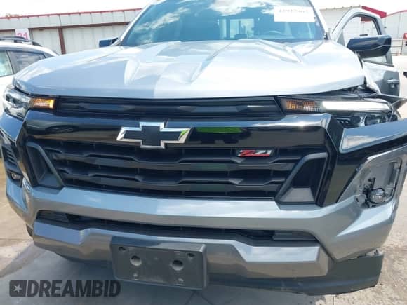 2023 Chevrolet Colorado 4WD Z71 with VIN 1GCPTDEK3P1235293, listed as a IAAI auction lot 42927062 with 31,492 mi miles and . Bid and sale history available at DreamBid. Image 6.