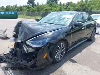 2021 Hyundai Sonata Limited with VIN KMHL34J23MA153530, listed as a IAAI auction lot 43020244 with 63,827 mi miles and . Bid and sale history available at DreamBid. Image 2.