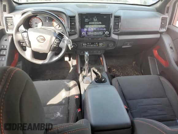 2023 Nissan Frontier Pro-4X with VIN 1N6ED1EK9PN671798, listed as a Copart auction lot 59122565 with 31,920 mi miles and Salvage title. Bid and sale history available at DreamBid. Image 8.