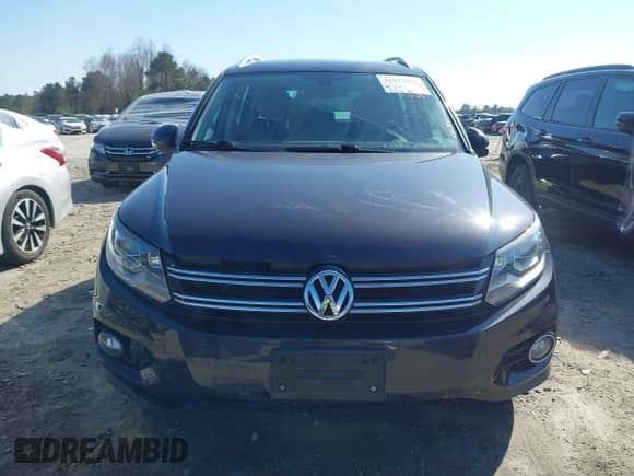 2016 Volkswagen Tiguan S with VIN WVGAV7AX6GW546573, listed as a IAAI auction lot 41672697 with 117,174 mi miles and . Bid and sale history available at DreamBid. Image 12.
