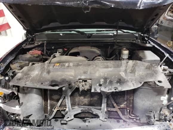 2011 Chevrolet Silverado 1500 LS z VIN 1GCRKREA6BZ297149, wystawiony jako Copart lot #68352385 z przebiegiem 93 390 mil mil oraz Szkoda całkowita • Salvage title. Historia ofert i sprzedaży dostępna na DreamBid. Obrazek 11.