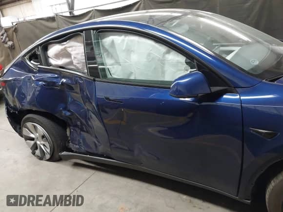 2023 Tesla Model Y Long Range с VIN 7SAYGDEE1PF592002, выставлен на аукционе IAAI как лот 43035517 с пробегом Не указан миль и . История ставок и продаж доступна на DreamBid. Изображение 12.