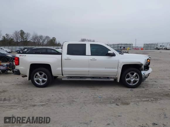 2015 Chevrolet Silverado 1500 LT with VIN 3GCUKREC4FG227814, listed as a IAAI auction lot 41501424 with 196,342 mi miles and . Bid and sale history available at DreamBid. Image 13.