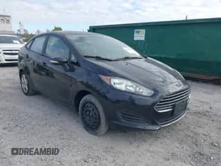 2015 Ford Fiesta SE z VIN 3FADP4BJ7FM129181, wystawiony jako IAAI lot #43541499 z przebiegiem 119 961 mil mil oraz . Historia ofert i sprzedaży dostępna na DreamBid. Obrazek 1.