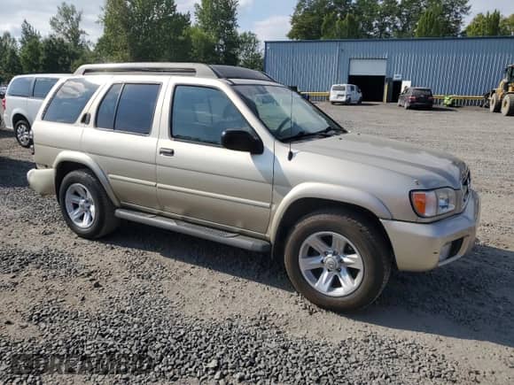 2002 Nissan Pathfinder SE with VIN JN8DR09Y92W737220, listed as a Copart auction lot 67274635 with 180,316 mi miles and Salvage title. Bid and sale history available at DreamBid. Image 4.