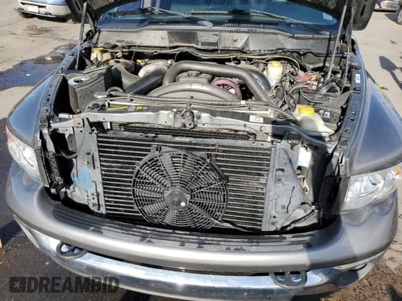 2005 Dodge 2500 SLT z VIN 3D7KS28C45G732377, wystawiony jako Copart lot #78273354 z przebiegiem 49 069 mil mil oraz Szkoda całkowita • Salvage title. Historia ofert i sprzedaży dostępna na DreamBid. Obrazek 11.