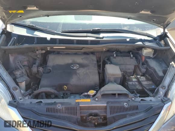 2014 Toyota Sienna LE AAS with VIN 5TDKK3DCXES518761, listed as a Copart auction lot 70665485 with 192,656 mi miles and Salvage title. Bid and sale history available at DreamBid. Image 12.