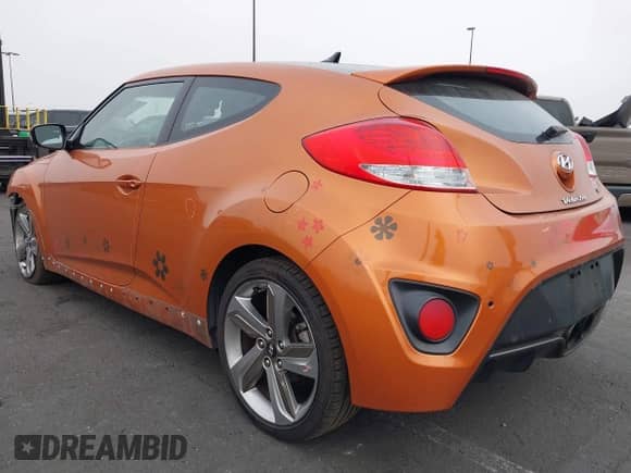 2013 Hyundai Veloster Turbo с VIN KMHTC6AE1DU128016, выставлен на аукционе IAAI как лот 42425892 с пробегом 104 209 миль миль и . История ставок и продаж доступна на DreamBid. Изображение 3.