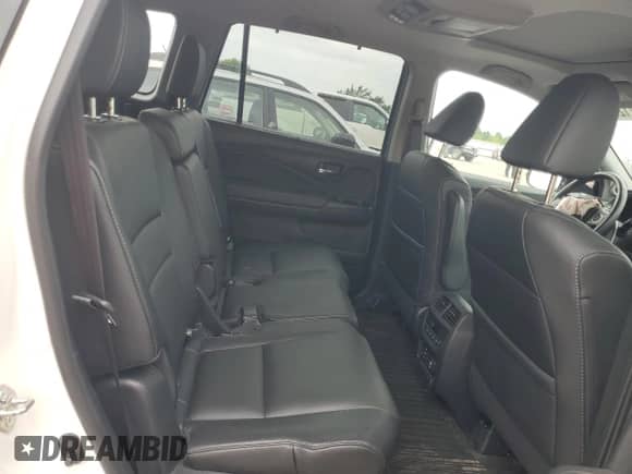 2018 Honda Pilot Touring с VIN 5FNYF6H98JB002945, выставлен на аукционе Copart как лот 68171235 с пробегом 98 223 миль миль и Списание • Salvage title. История ставок и продаж доступна на DreamBid. Изображение 11.