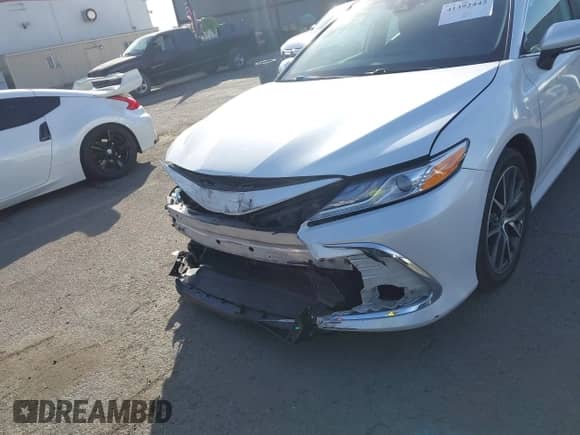 2023 Toyota Camry Hybrid XLE с VIN 4T1F31AK7PU053459, выставлен на аукционе IAAI как лот 41392442 с пробегом 102 176 миль миль и . История ставок и продаж доступна на DreamBid. Изображение 6.