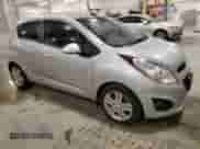 2015 Chevrolet Spark LS with VIN KL8CA6S91FC743677, listed as a Copart auction lot 87463645 with 42,030 mi miles and Salvage title. Bid and sale history available at DreamBid. Image 4.
