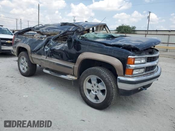 1999 Chevrolet Tahoe с VIN 3GNEK18R0XG106650, выставлен на аукционе Copart как лот 63455944 с пробегом 158 146 миль миль и На запчасти • Non repairable. История ставок и продаж доступна на DreamBid. Изображение 4.
